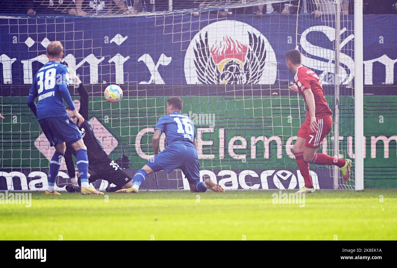 Karlsruhe, Germany. 23rd Oct, 2022. Soccer, 2nd Bundesliga, Karlsruher SC - Fortuna Düsseldorf, Matchday 13, at BBBank Wildpark. Düsseldorf's Kristoffer Peterson (r) scores the goal for 0:1, which Karlsruhe goalkeeper Marius Gersbeck (2nd from left) is unable to keep out. Credit: Uli Deck/dpa - IMPORTANT NOTE: In accordance with the requirements of the DFL Deutsche Fußball Liga and the DFB Deutscher Fußball-Bund, it is prohibited to use or have used photographs taken in the stadium and/or of the match in the form of sequence pictures and/or video-like photo series./dpa/Alamy Live News Stock Photo