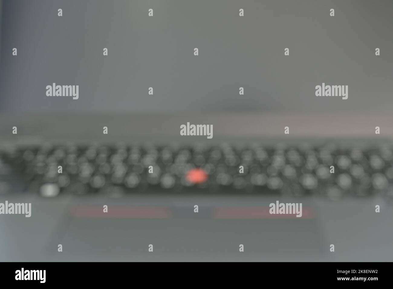 blurry keyboard on black compute laptop background and texture Stock Photo