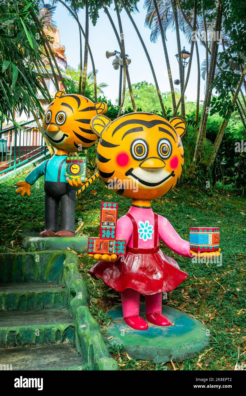 Tiger Statue holding Tiger Balm product. This park has statues and
