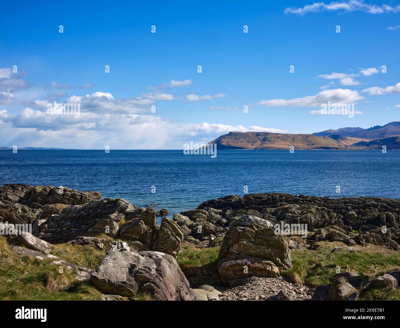East from the B8001 by Skipness, a view with the northern tip of the Isle of Arran across the Kilbrannan Sound. Tarbert, Argyll and Bute. Scotland Stock Photo