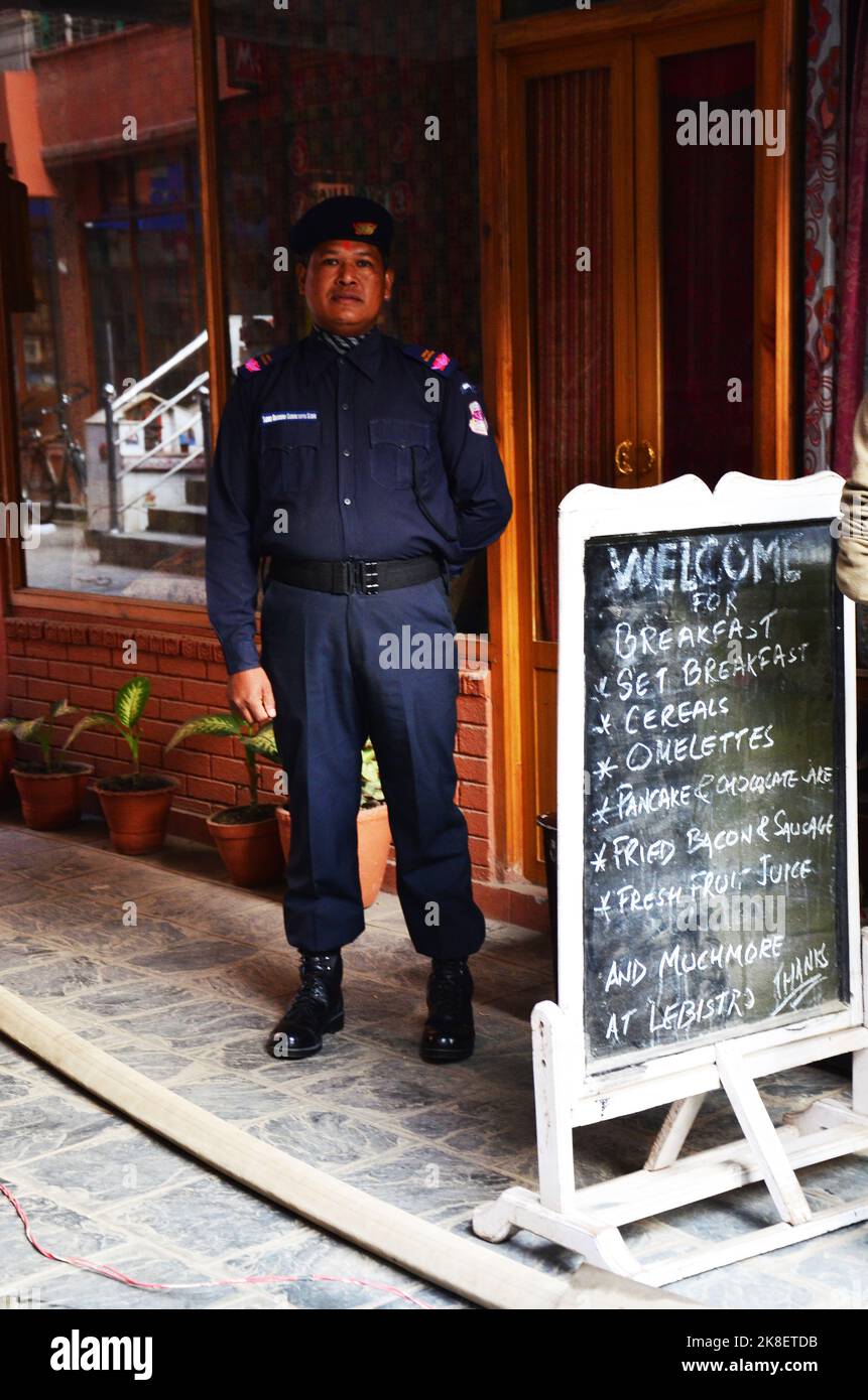Security guard nepalese people standing and monitor watch out for