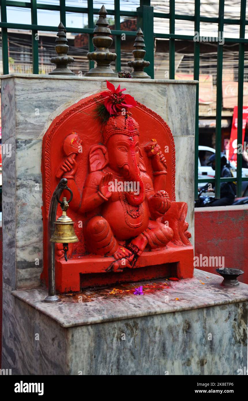 Ancient ganesha statue or ganesh figure lord of success in small shrine