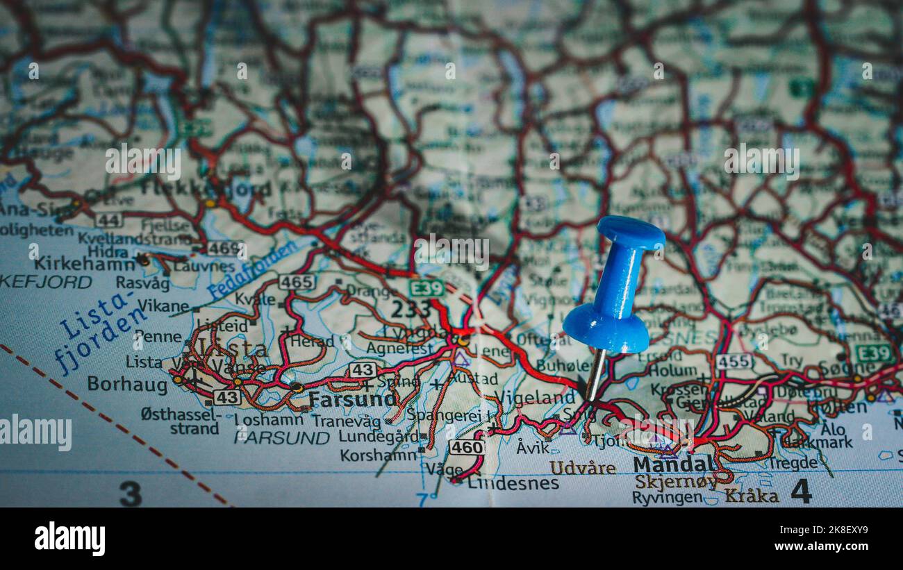 Vigeland, Norway. Blue pinhead on map Stock Photo - Alamy