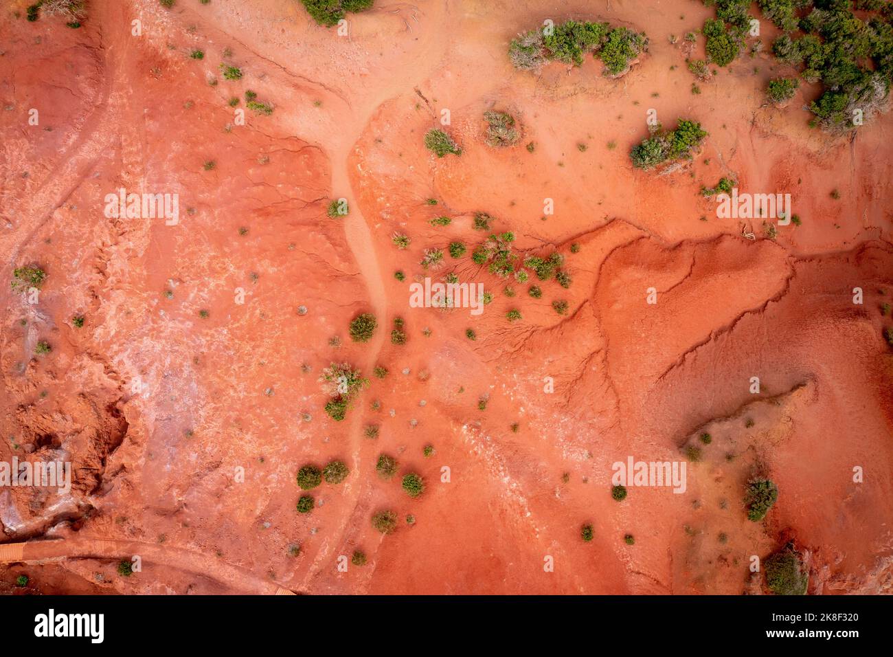 La Gomera, Canary Islands - Aerial view of erosion landscape with red soil on the north coast above Agulo with a view to Tenerife. Stock Photo
