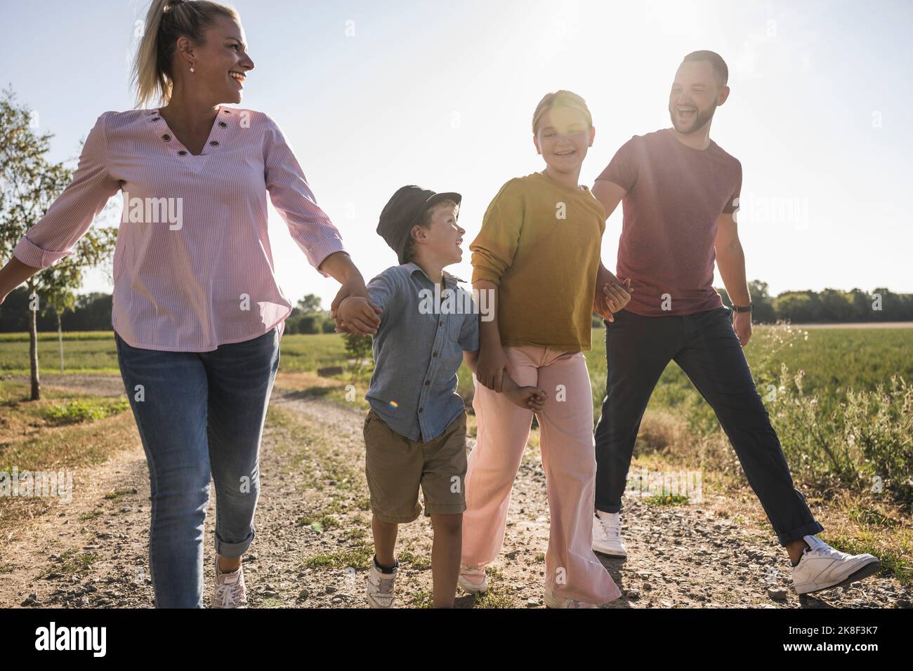 Child adult holding hands walking hi-res stock photography and images ...