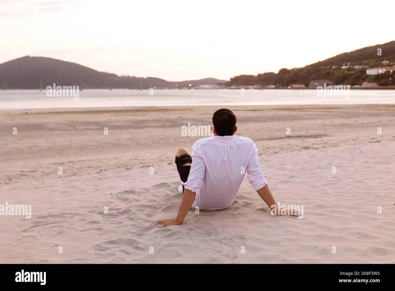 Person watching sunset hi-res stock photography and images - Alamy