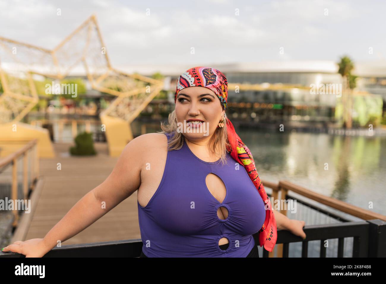 Smiling woman wearing headscarf hi-res stock photography and images - Alamy