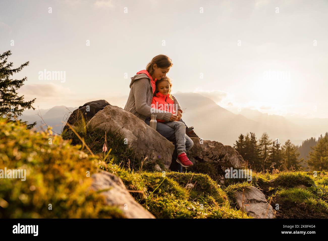 Mom With Rocks Girl sitting on a rock hi-res stock photography and images - Alamy