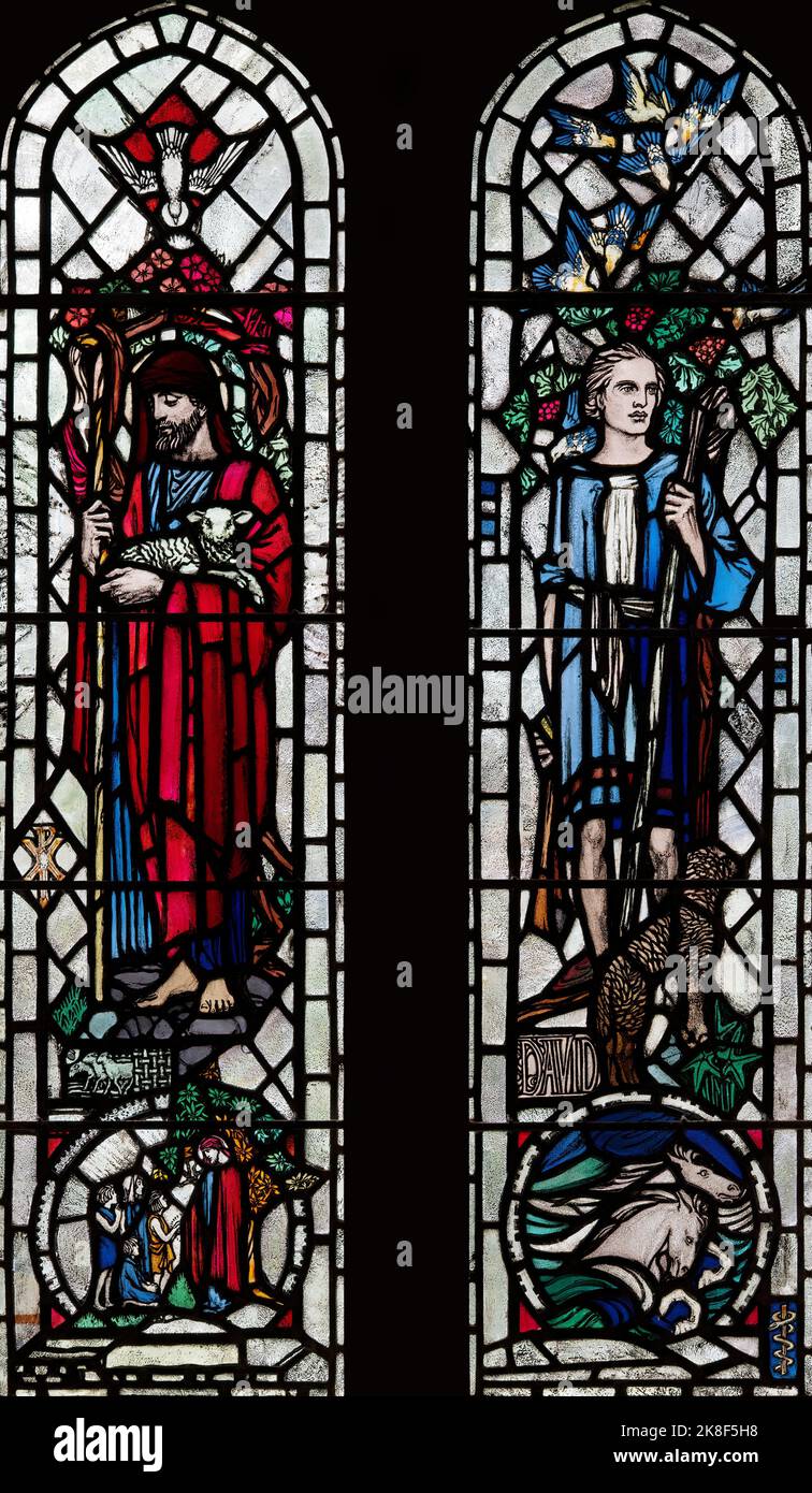 'The Good Shepherd' and 'David, the shepherd boy' by M. Kemp and M. Chilton (1930), St Cuthbert's Church, Milburn, Cumbria, UK Stock Photo