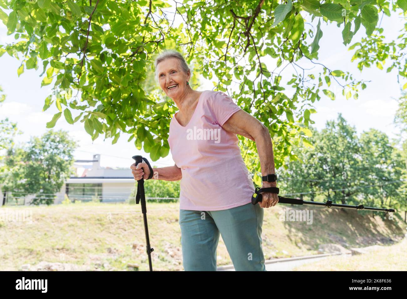 Happy woman walking stick hi-res stock photography and images - Alamy