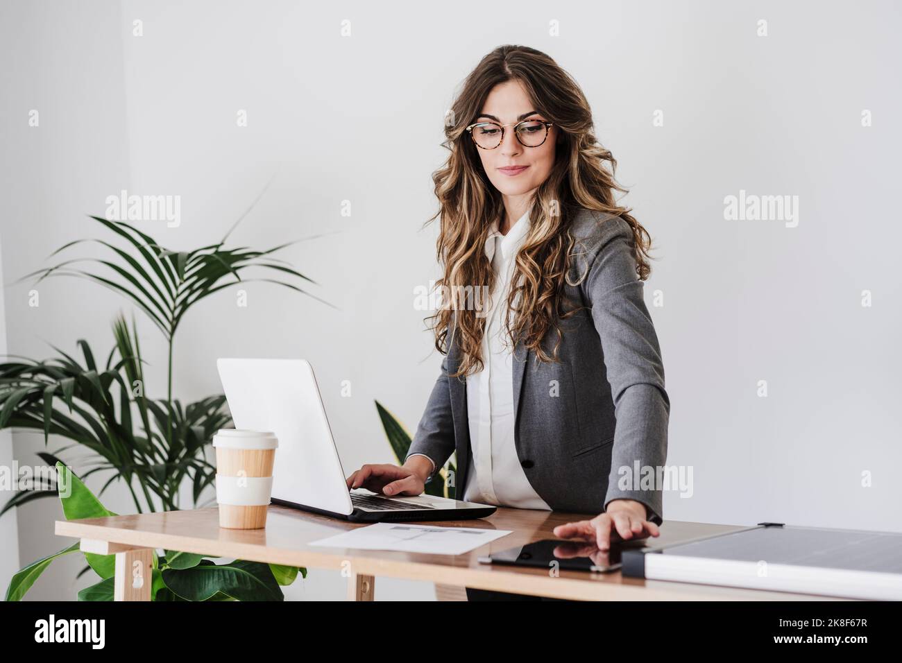 Young female engineer working in her modern office Stock Photo