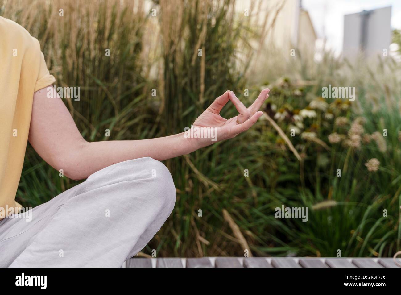 Hand of woman with mudra position Stock Photo