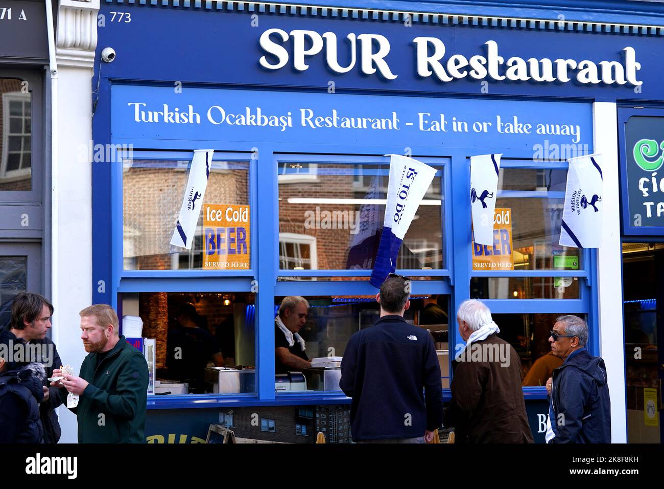 Tottenham Hotspur fans buy food from Spur Restaurant ahead of the Premier League match at The Tottenham Hotspur Stadium, London. Picture date: Sunday October 23, 2022. Stock Photo