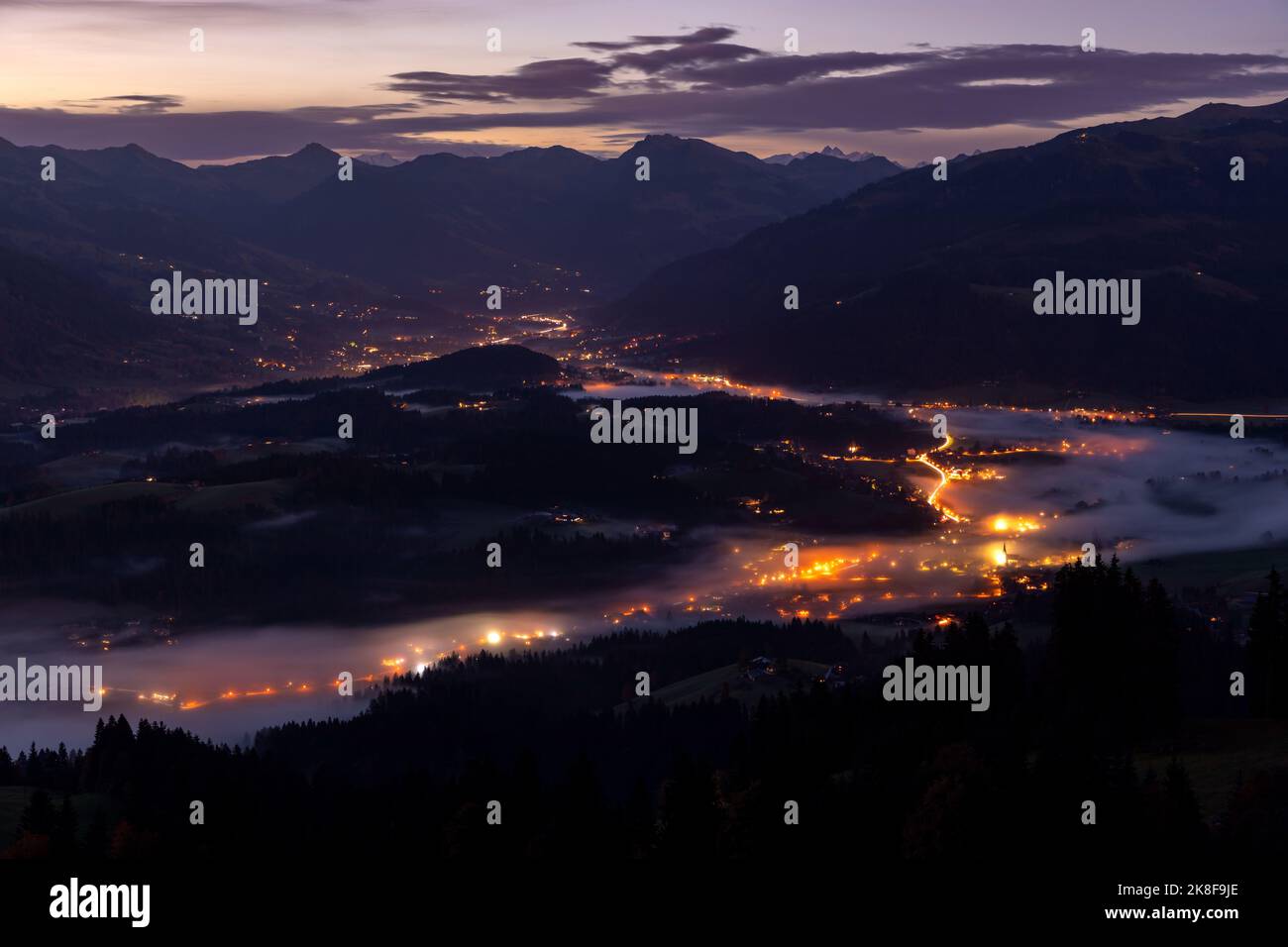 View from lake Astbergsee into Lenkental valley towards Kitzbuehel, Tyrol, Austria in early morning Stock Photo