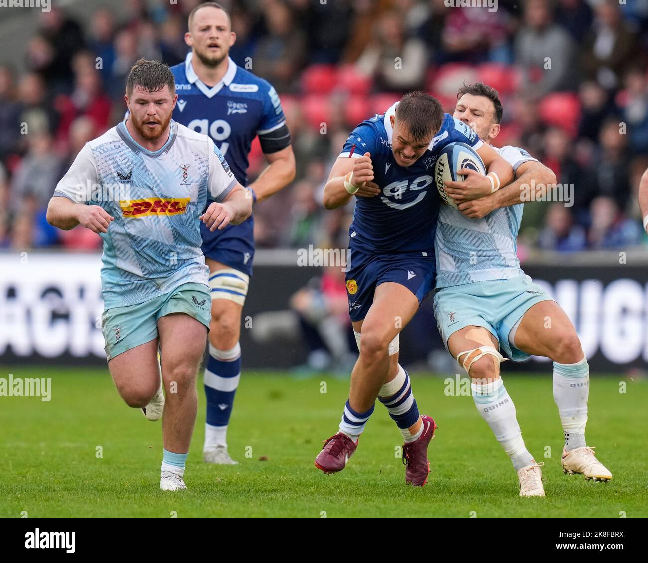 Danny Care 9 of Harlequins tackles Joe Carpenter 15 of Sale Sharks