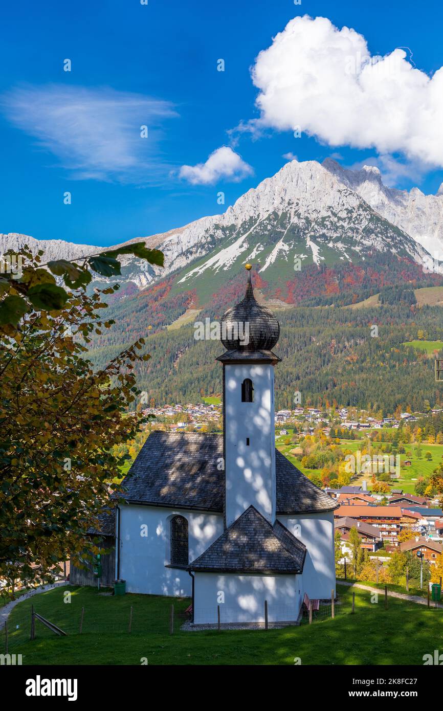 Marienkapelle, a chapel above Ellmau in front of Wilder Kaiser mountains, Tyrol, Austria Stock Photo