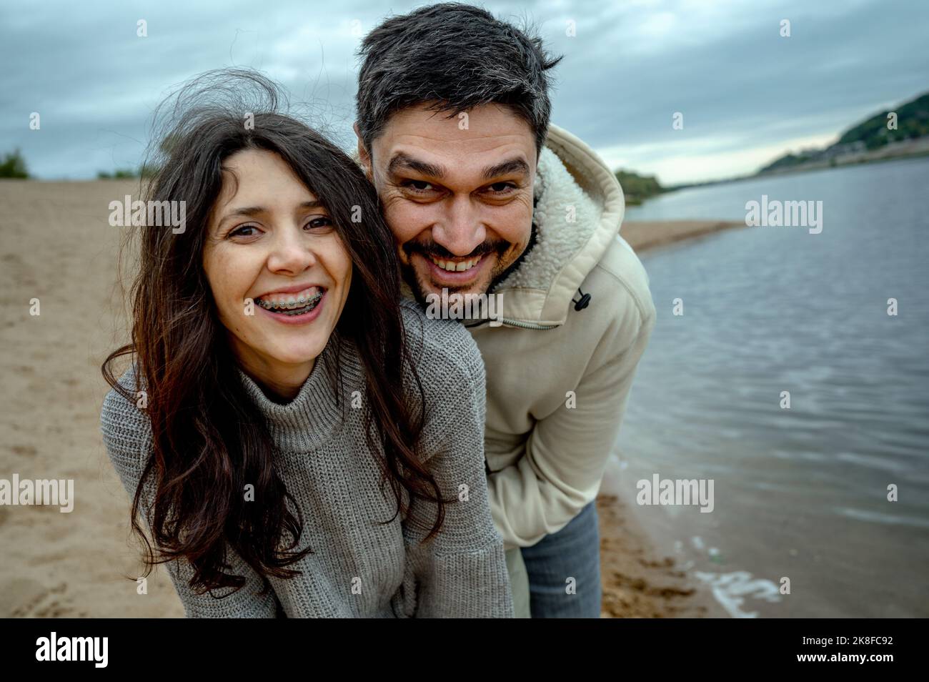 Portrait happy couple riverside hi-res stock photography and images - Alamy