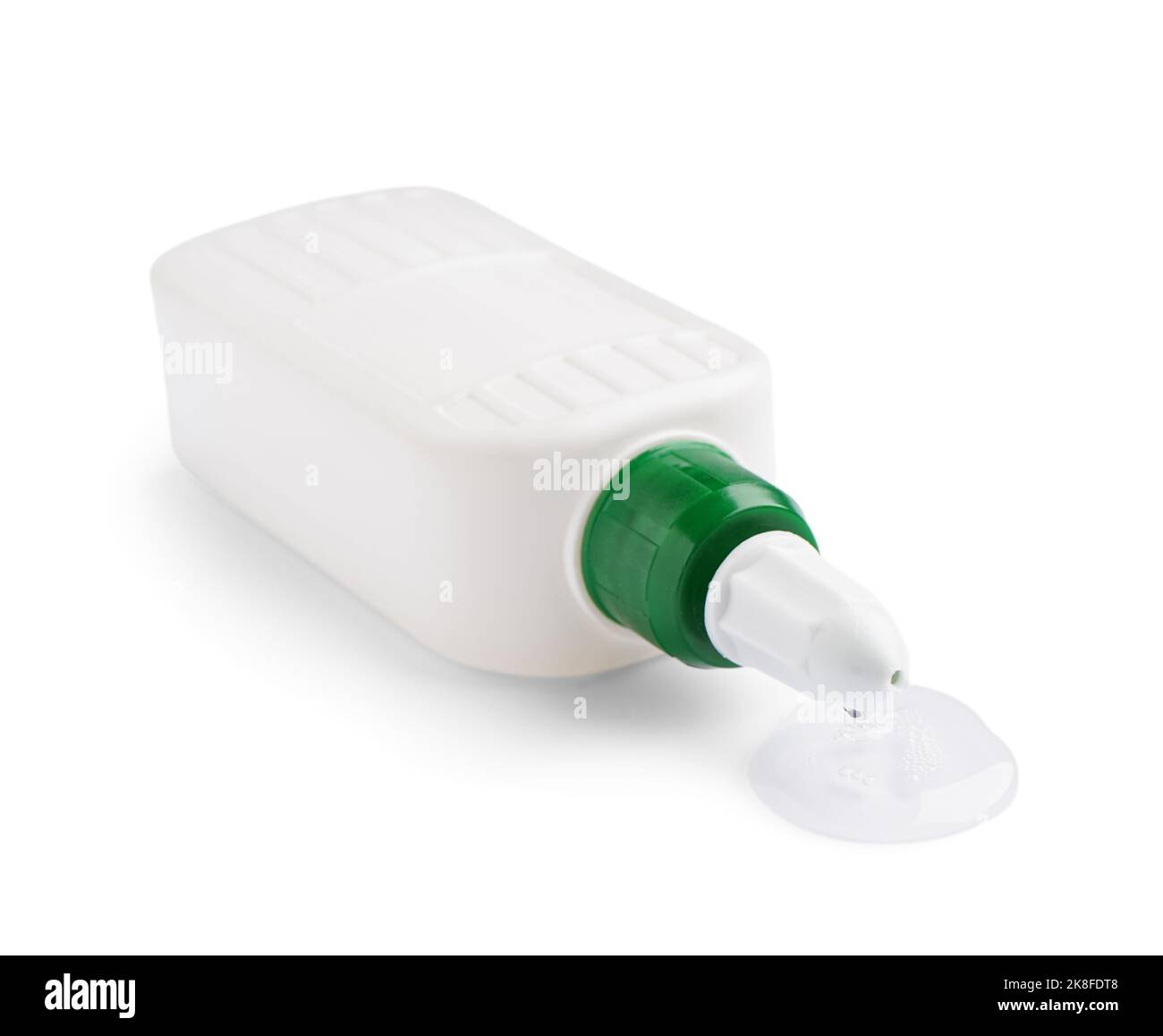 Bottle with spilled glue on white background Stock Photo - Alamy