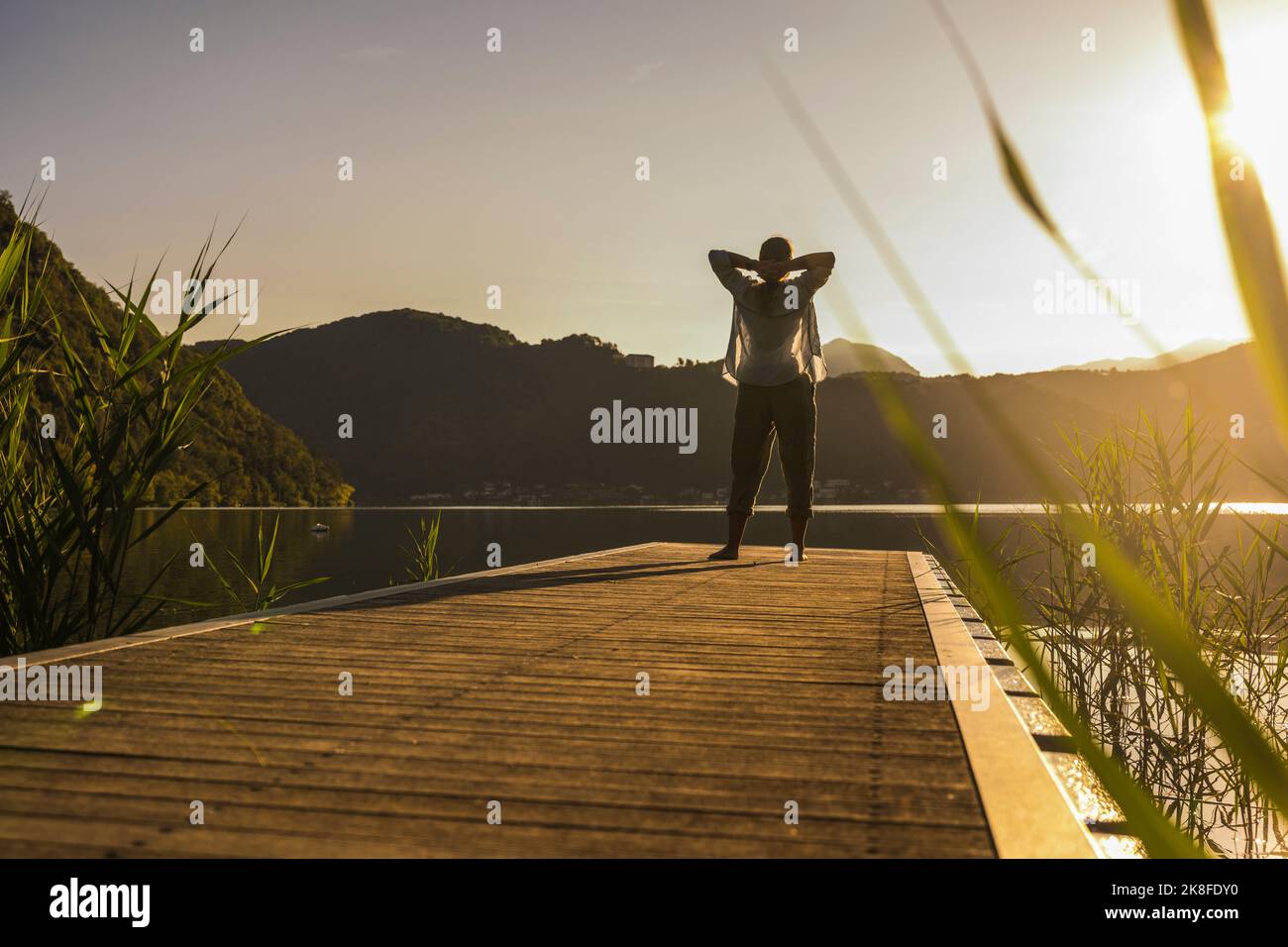 Female rear view hands on head hi-res stock photography and images - Alamy