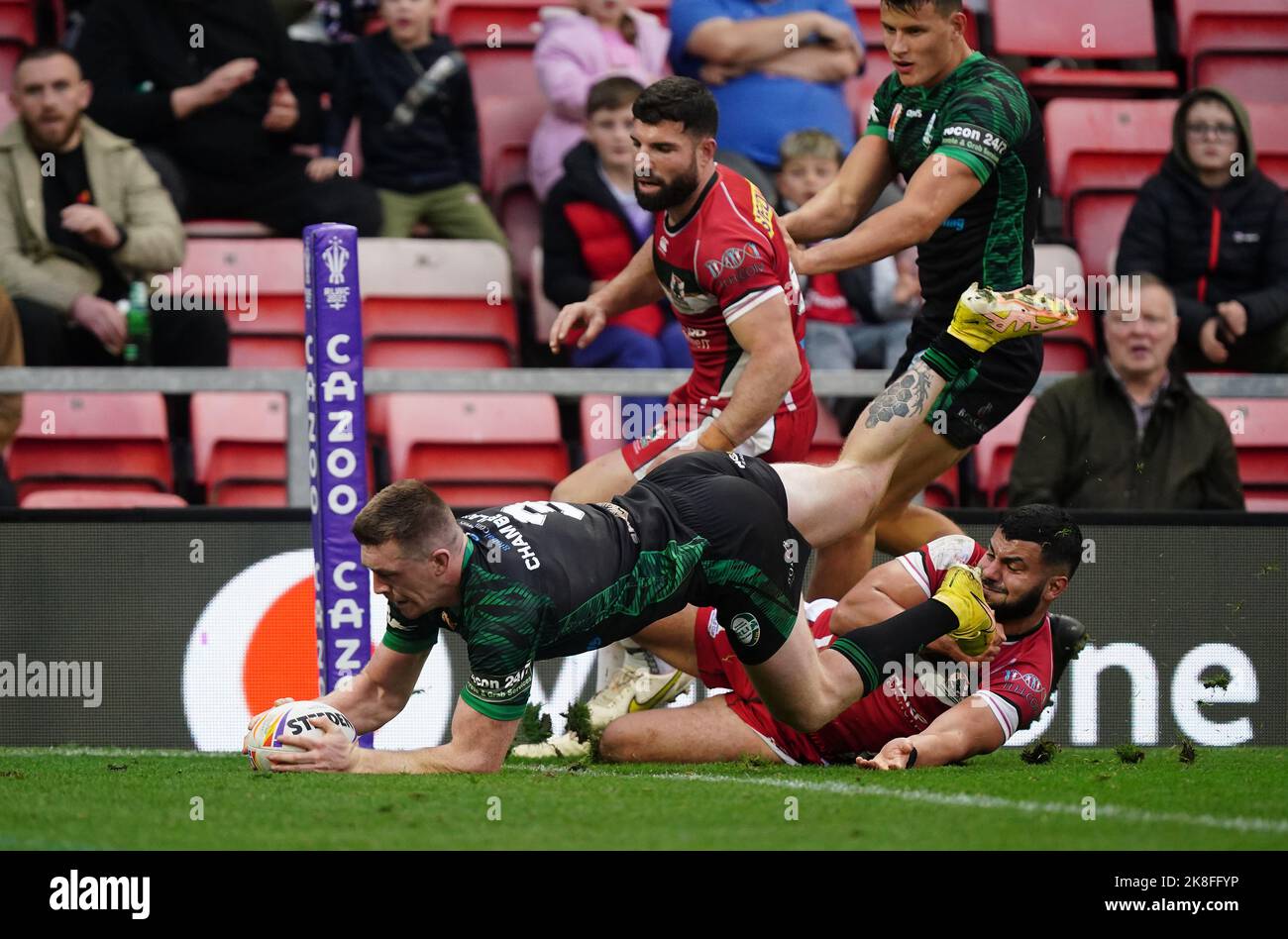 Ireland's Ed Chamberlain scores their side's third try during the Rugby League World Cup group A match at the Leigh Sports Village, Leigh. Picture date: Sunday October 23, 2022. Stock Photo