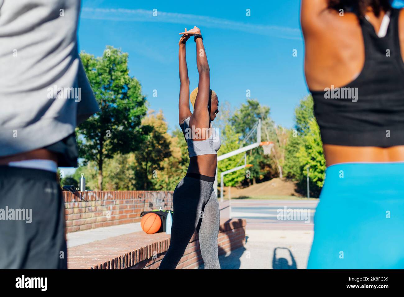 Man stretching arms raising african hi-res stock photography and images ...