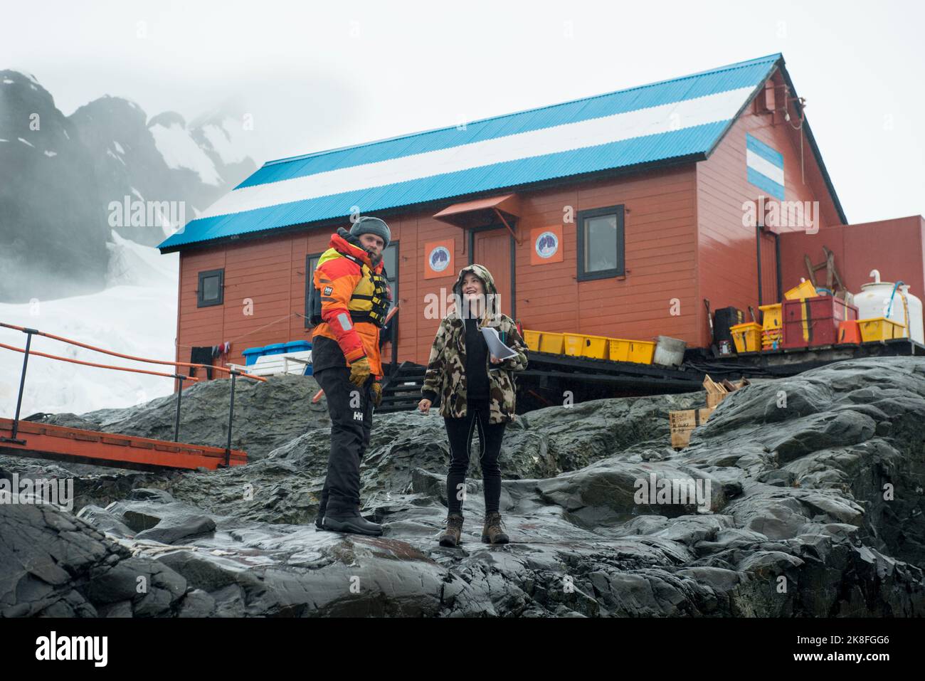 A cruise ship leader discusses landing proceedure at the Argentinian Antarctic -  Base Brown in Paradise Harbour Stock Photo