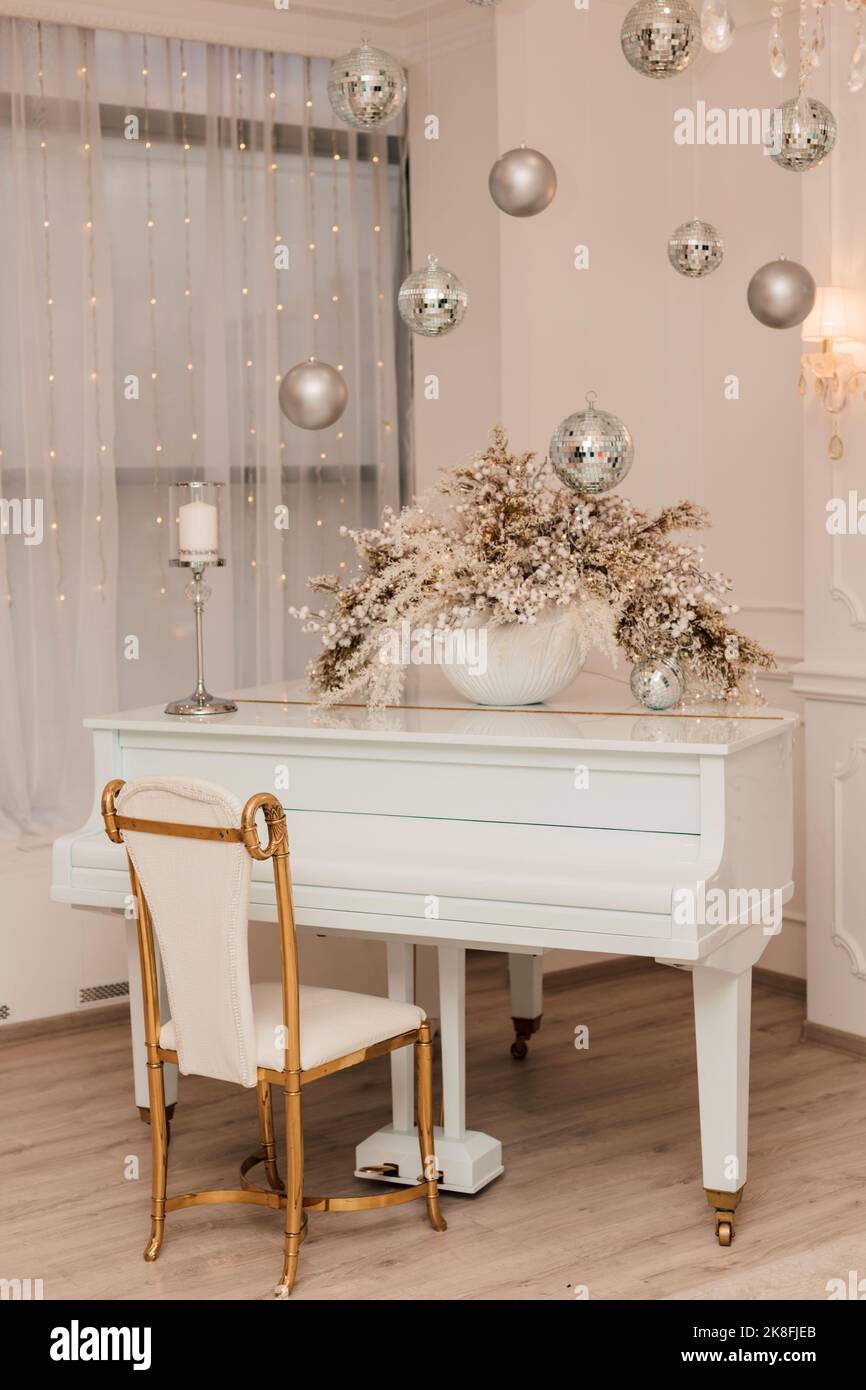 White luxury grand piano in a bright New Year's interior Stock Photo ...