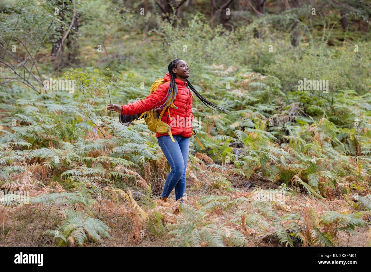 Young woman enjoying forest hi-res stock photography and images - Alamy