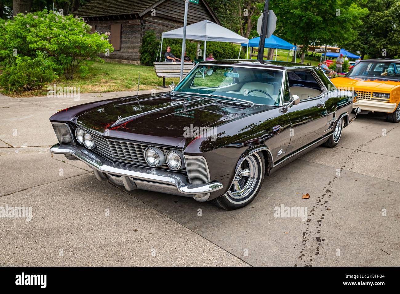 Des Moines, IA - July 01, 2022: High perspective front corner view of a 1964 Buick Riviera Hardtop Coupe at a local car show. Stock Photo
