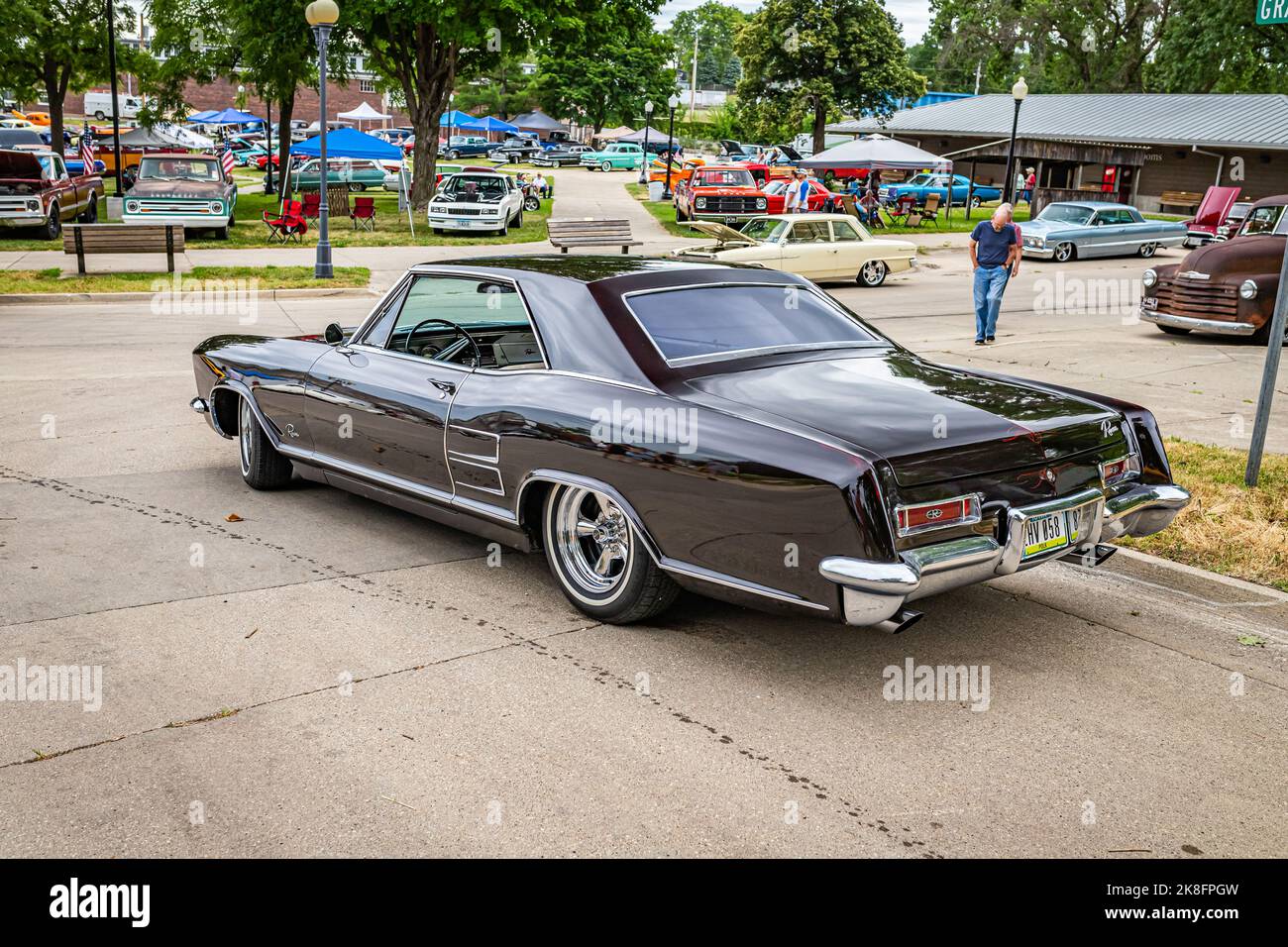 Des Moines, IA - July 01, 2022: High perspective rear corner view of a 1964 Buick Riviera Hardtop Coupe at a local car show. Stock Photo