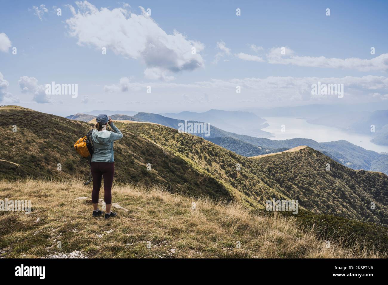 Mature woman hiking through cloud hi-res stock photography and images ...
