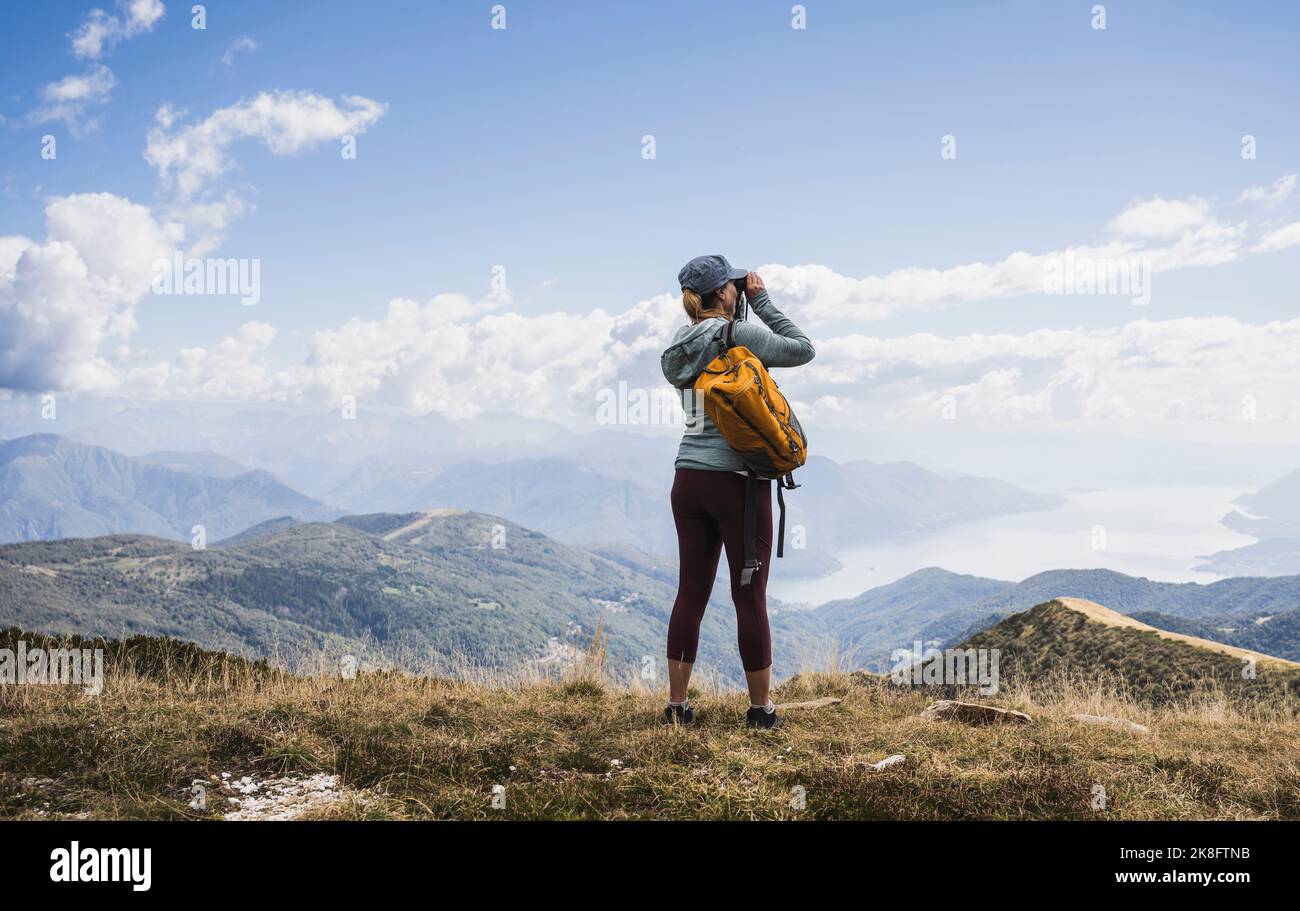 Mature woman hiking through cloud hi-res stock photography and images ...