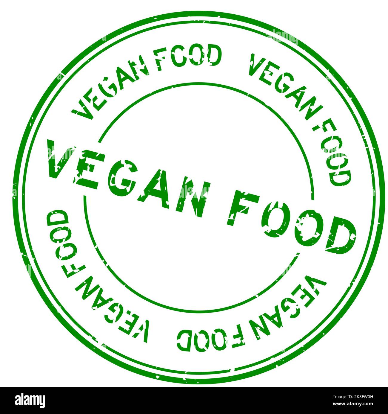 Grunge green vegan food word round rubber seal stamp on white ...