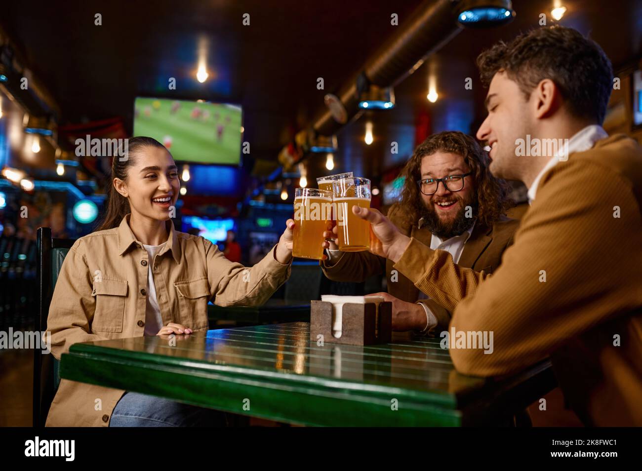 Clinking excited fans in hi-res stock photography and images - Alamy
