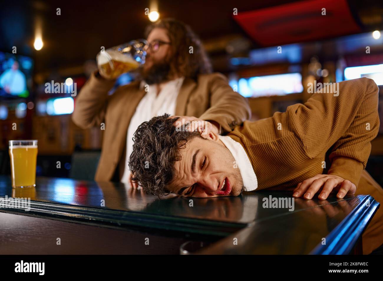 Crazy behavior of football fans at sport bar Stock Photo