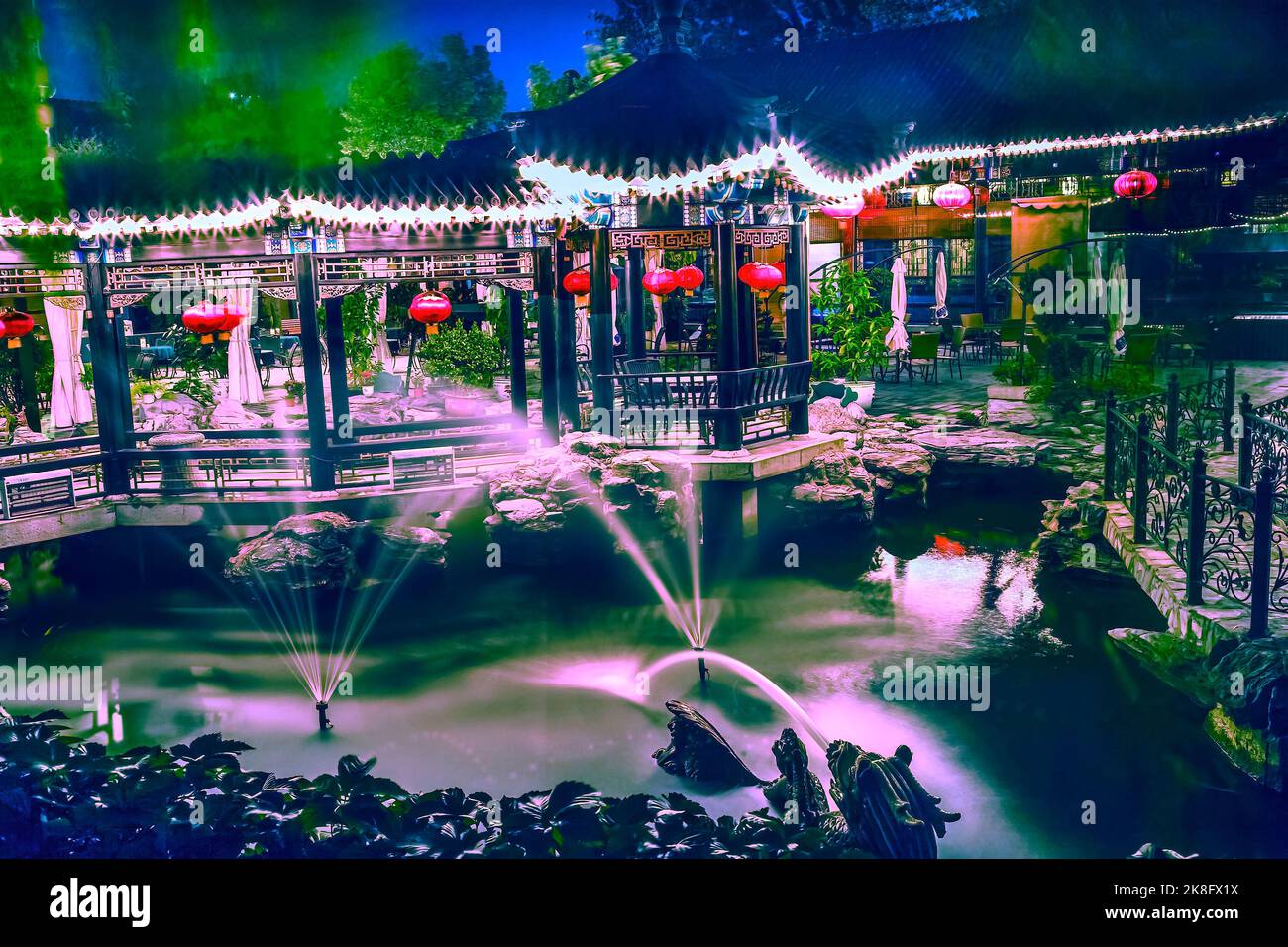 Colorful Ornate Red Lanterns Fountains Night Illuminated Temple of the Sun Beijing China Stock Photo