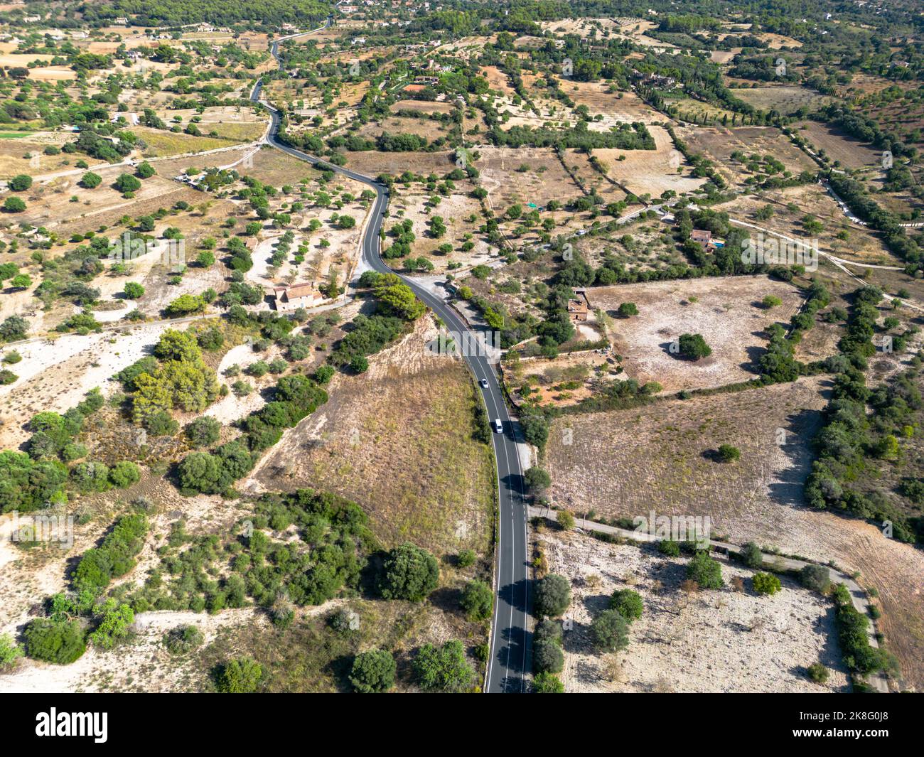 Aerial, drone landscape view of the Main road in south west Majorca, Mallorca on a beautiful sunny afternoon in September Stock Photo
