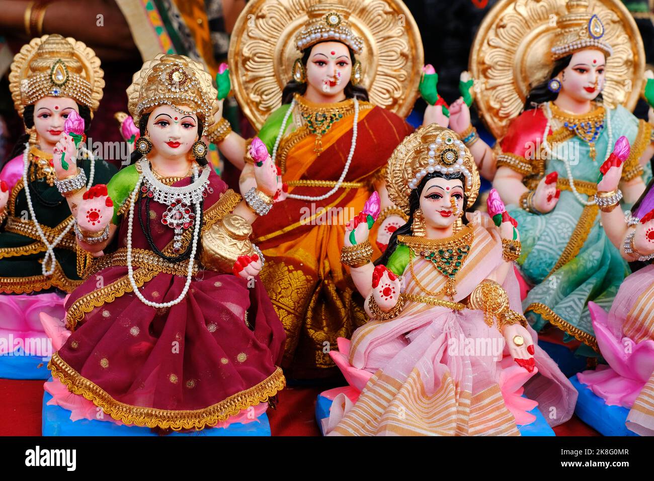 Beautiful statues of godess Lakshmi displayed for sale during festival