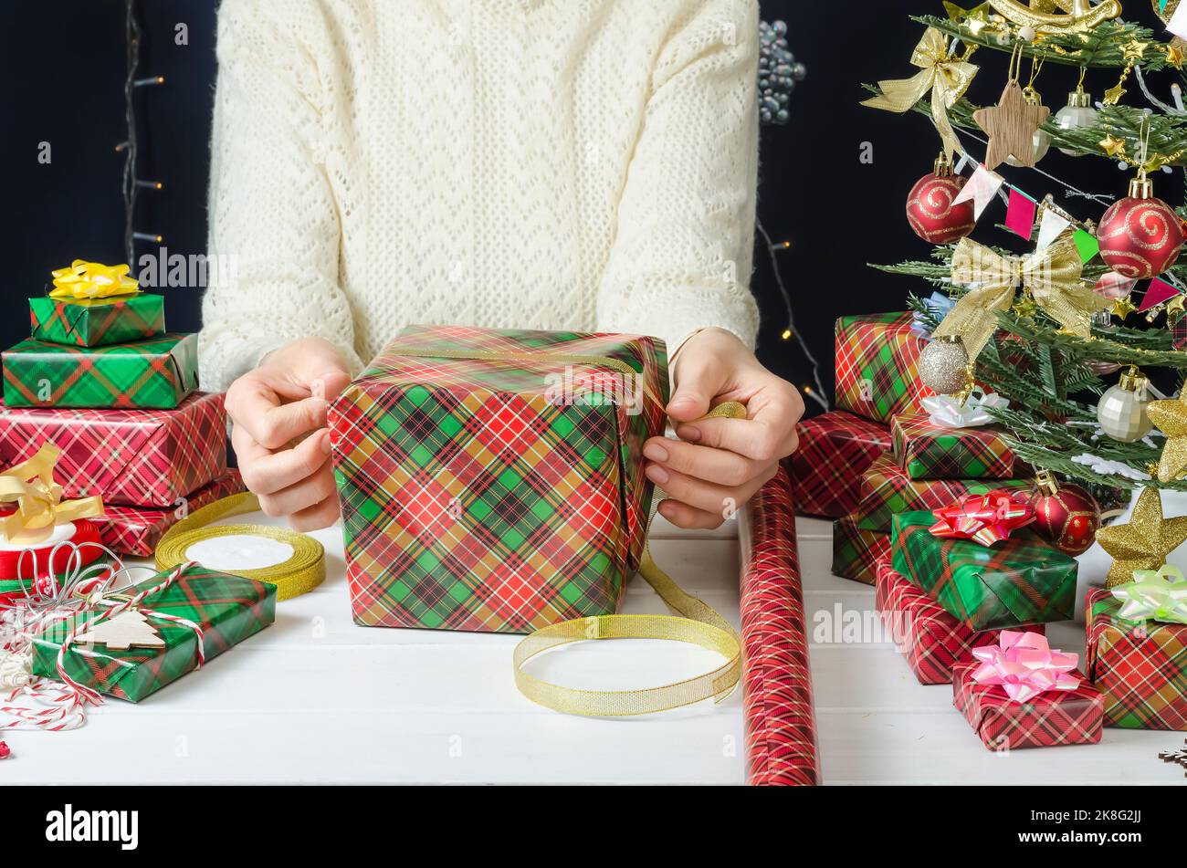 Step by Step Photo Instructions for Wrapping a Christmas Gift, Step 6