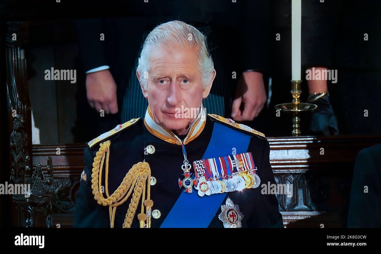 KING CHARLES III Queen Elizabeth II Funeral at Saint George’s Chapel Windsor Castle. A pensive sad reflective King Charles III during HM The Queen interior Royal Chapel funeral service at Windsor. UHD broadcast still. 19th September 2022 Stock Photo