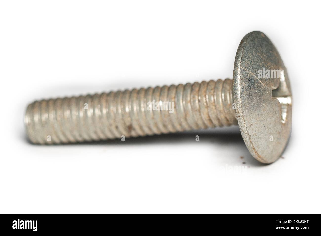 Old rusted screws on a white background Stock Photo