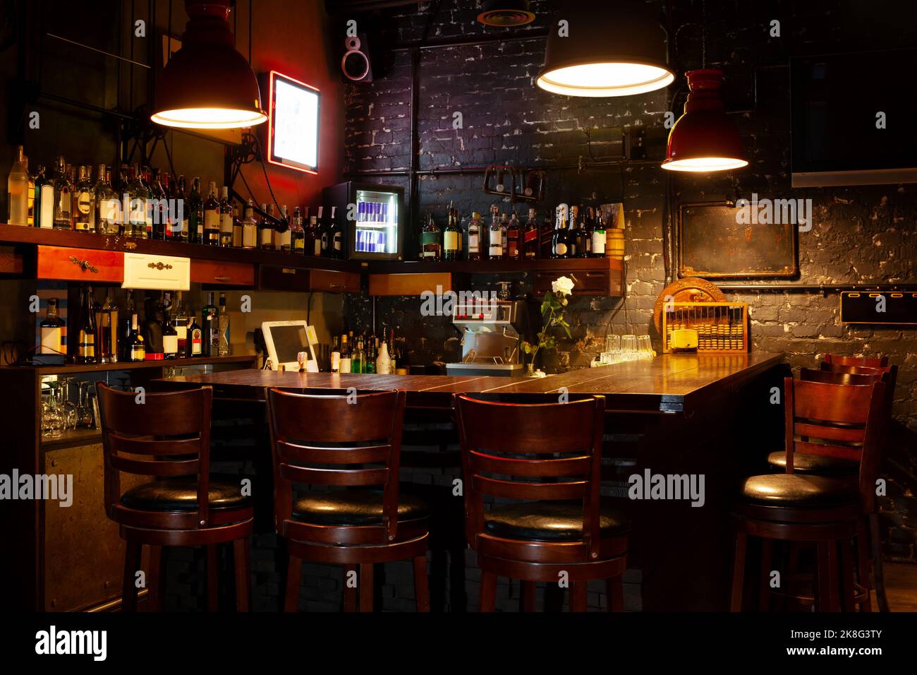 Dark moody interior of modern european pub. Stock Photo