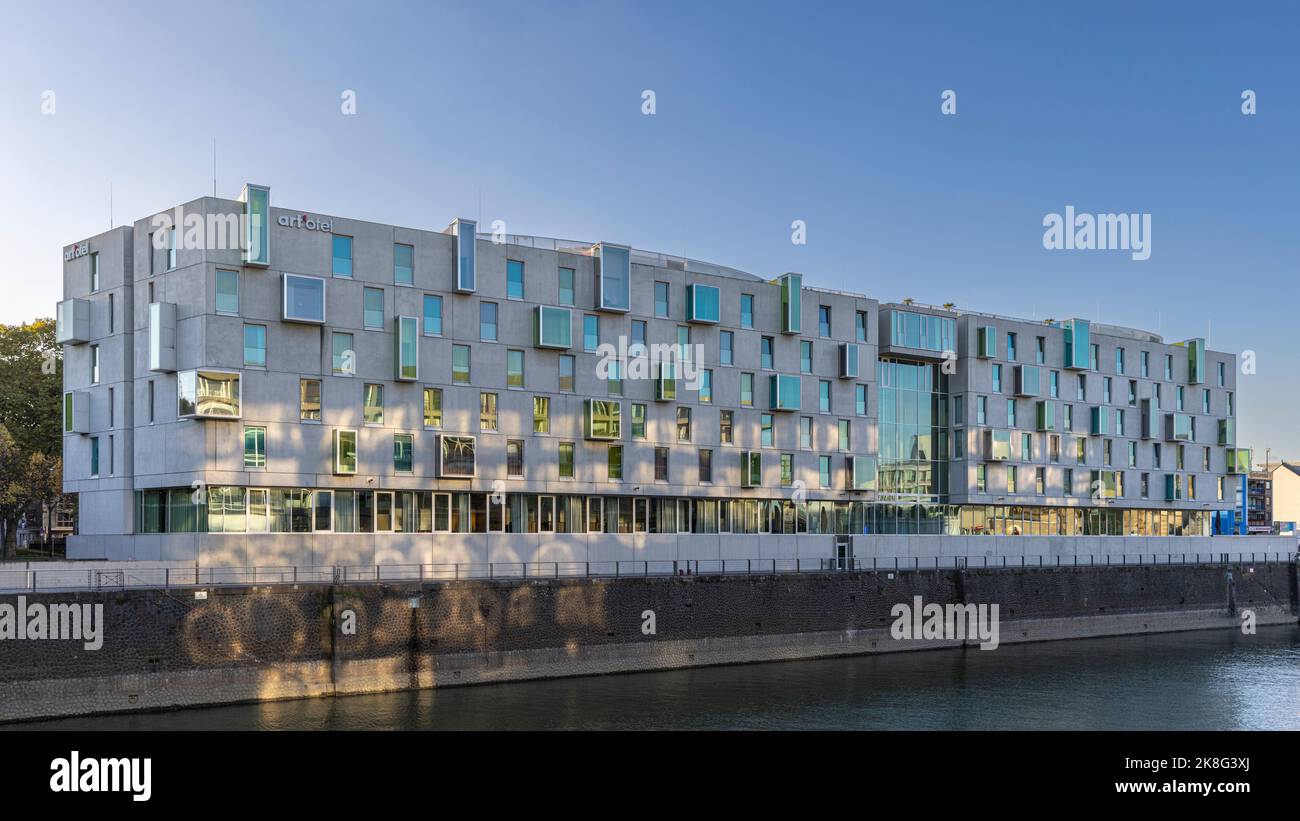 Gen Re Building Cologne Modern building standing on river banks of Rhine in Cologne on a bright ...