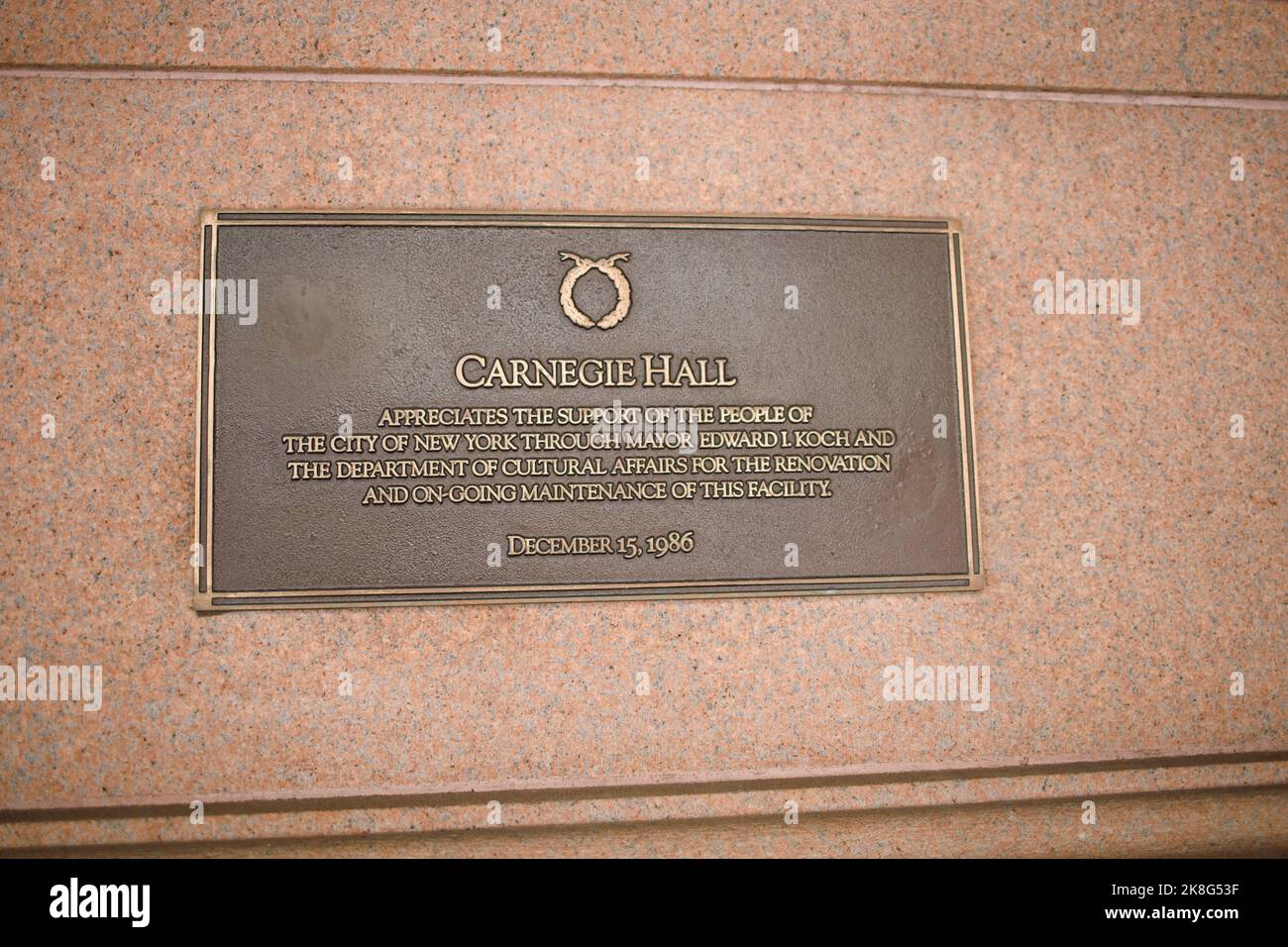 New York, NY, USA - Oct 23, 2022: A sign on outside wall of Carnegie Hall thanking the late Mayor Koch and others for renovations completed in 1986 Stock Photo