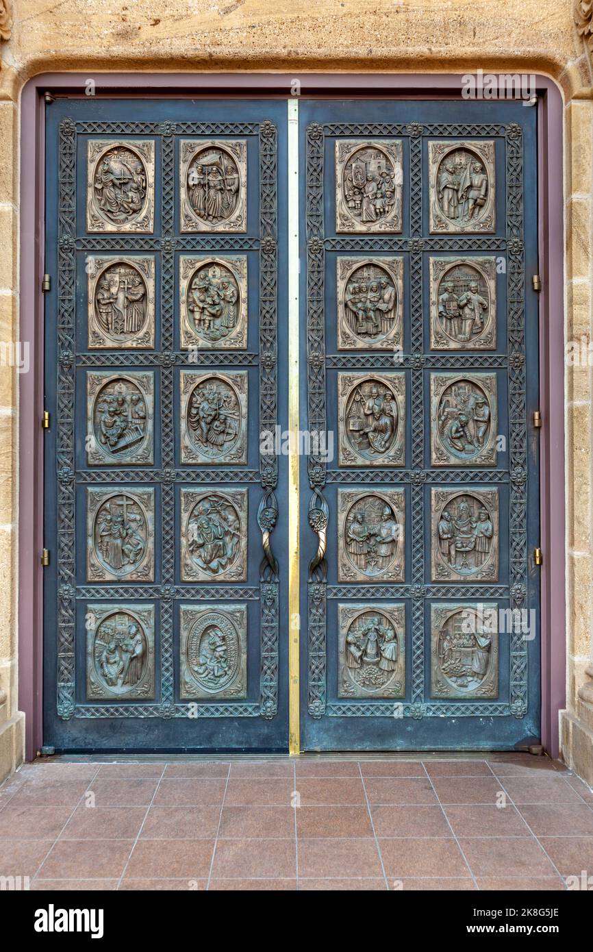 Bronze doors on the Cathedral Basilica of Saint Francis of Assisi - Catedral basílica de San Francisco de Asís in Santa Fe, New Mexico. During the res Stock Photo