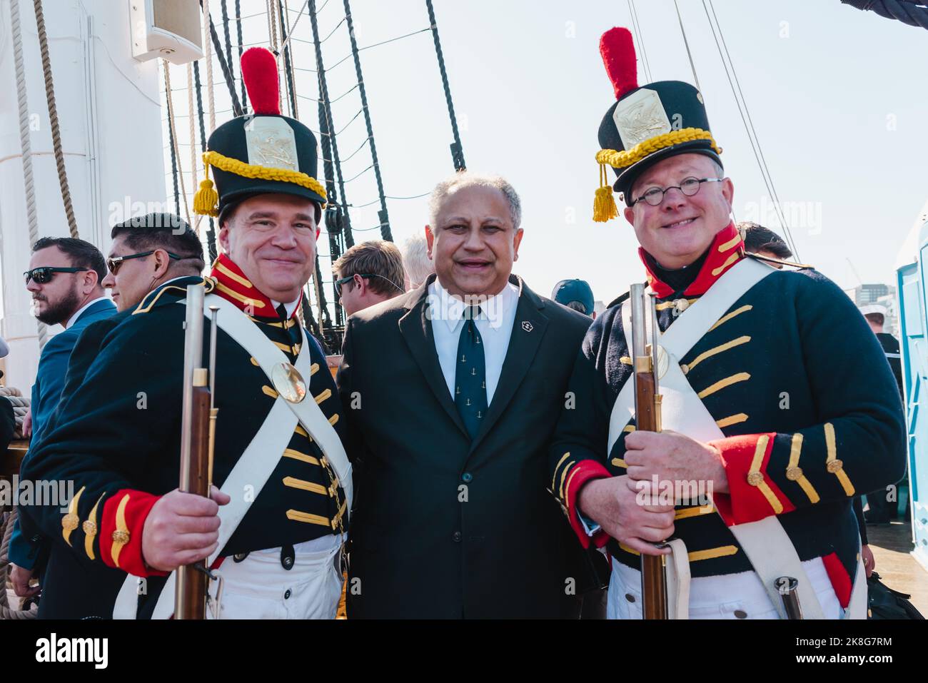 US Secretary of the Navy Carlos Del Toro posing with members of the 1812 Marines on USS Constitution underway for the 225th birthday celebration. Stock Photo
