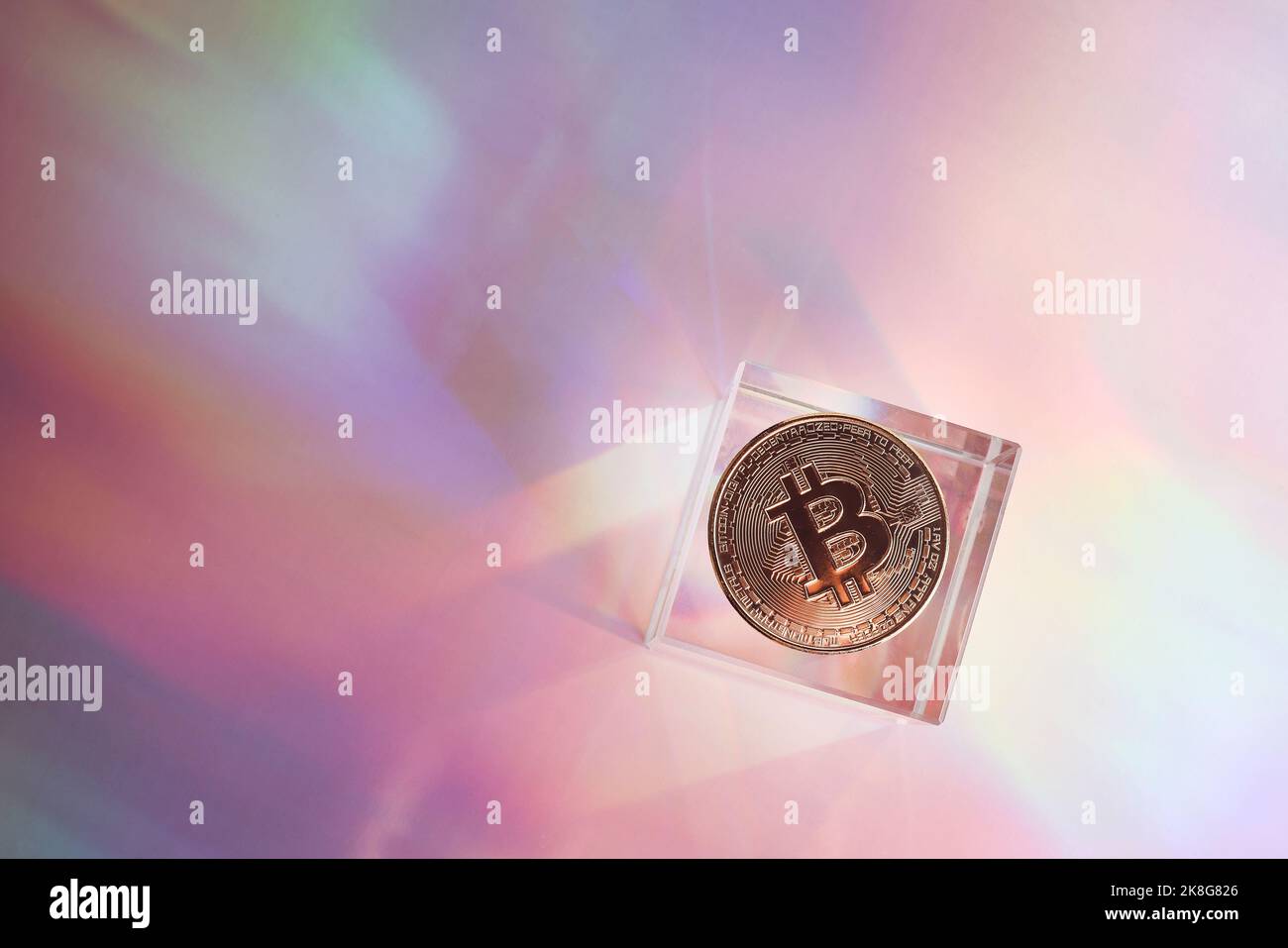 Golden bitcoin coin on holographic, abstract, neon background. digital currency, business style. Mining and trade bitcoin concept. Stock Photo