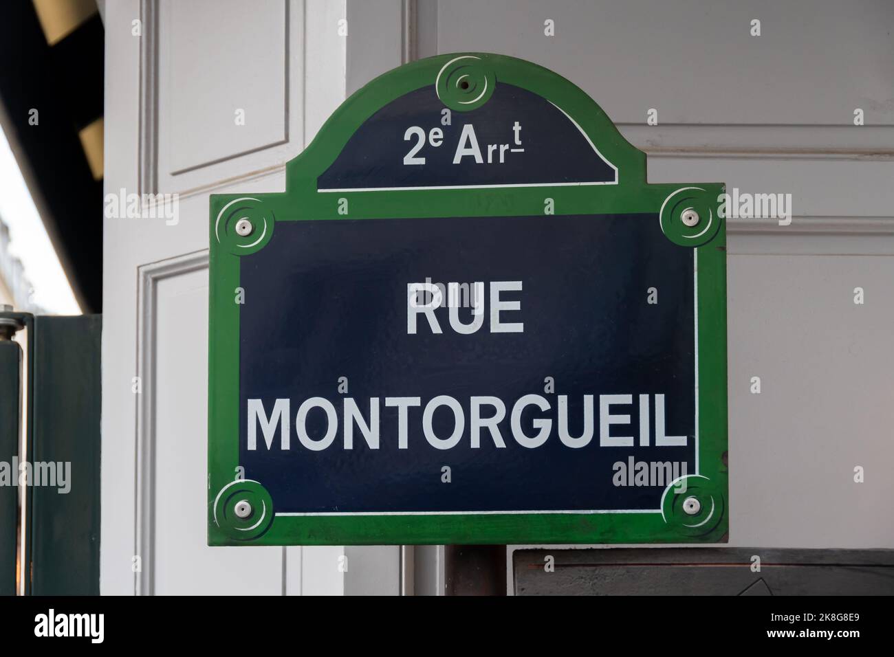 Traditional Parisian street sign with 'Rue Montorgueil' written on it, a touristic pedestrian street of Paris, France Stock Photo