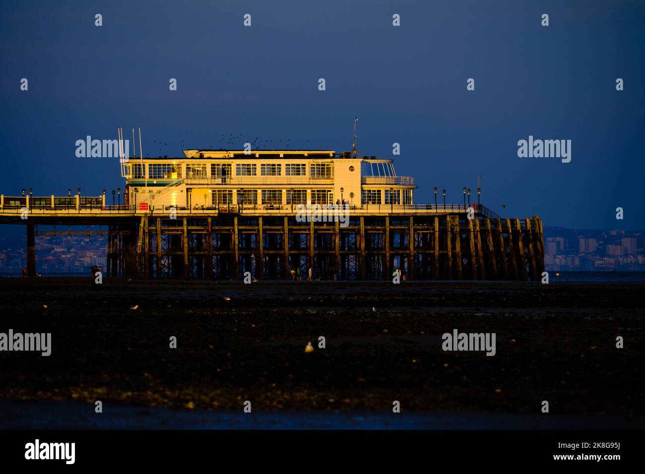 Worthing pier southern pavilion in the late summer evening sun on