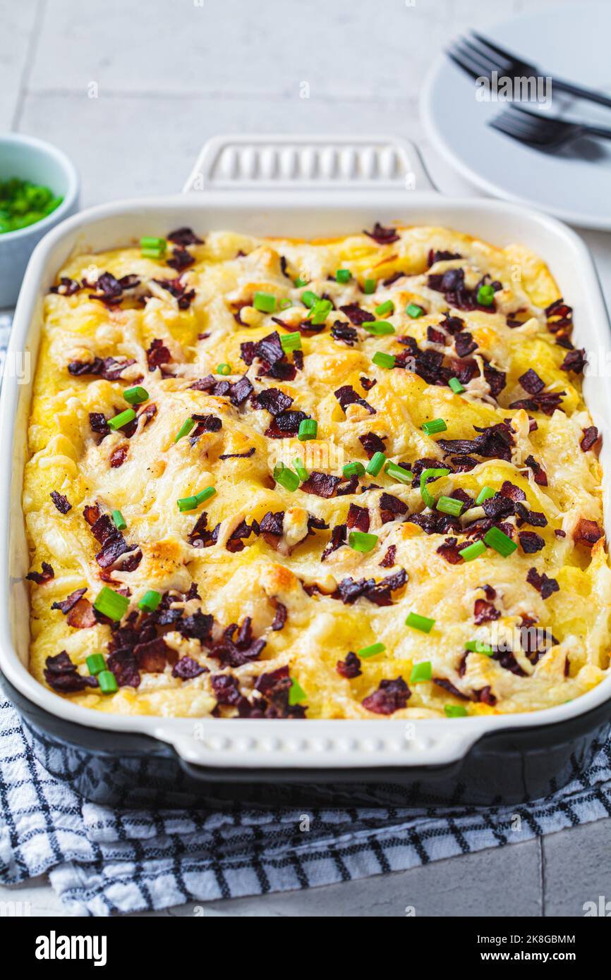 Baked mashed potatoes with bacon and green onions. Festive Christmas or Thanksgiving Day dish. Stock Photo